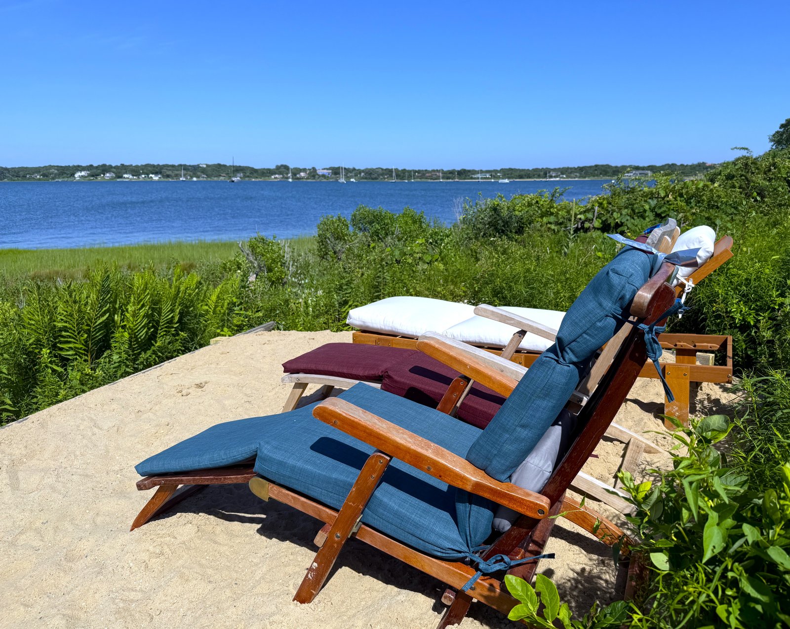 lounge chairs on sand