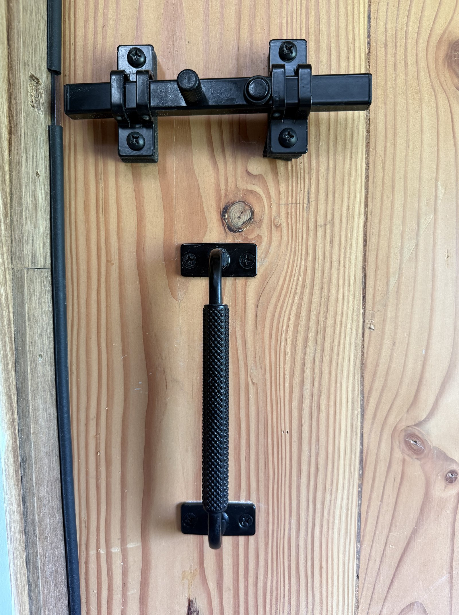 handle and door latch of north bathroom